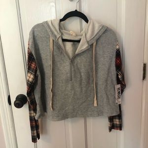 Gray sweatshirt with plaid sleeves